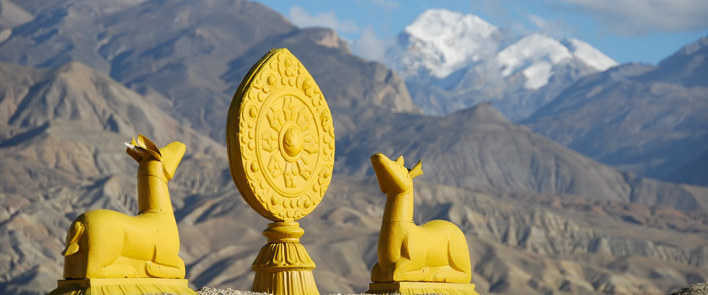 Mustang landscape with golden statue