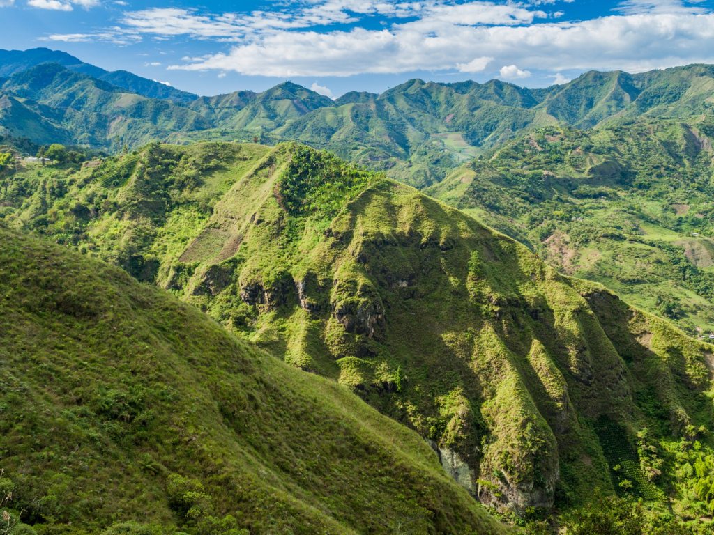 Groene bergen in Tierradentro-vallei, Colombia – reizen met Explore.